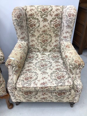 Lot 137 - Georgian style wing back armchair with floral upholstery on cabriole front legs and one other similar chair (2)
