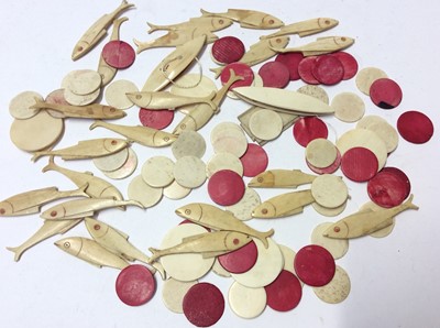 Lot 1098 - Large collection of carved bone gaming counters in the form of fish, together with other circular carved and stained bone counters (qty)