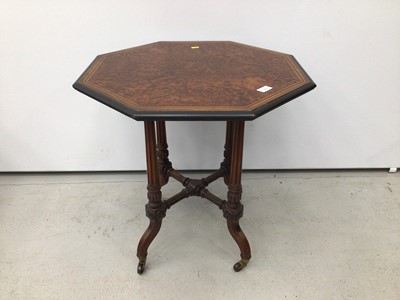 Lot 153 - Good quality late Victorian burr walnut occasional table by Langebear & Co, the octagonal top with crossbanded and inlaid stringing on four fluted and turned legs joined by conforming cross stretch...