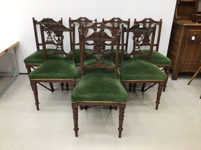 Lot 154 - Matched set of eight Edwardian carved walnut dining chairs with pierced splat back, green upholstered seats on turned front legs