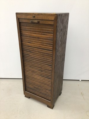 Lot 156 - 1930's oak filing cabinet with pull out sliding trays enclosed by tambour shutter, with lock and key, 47cm wide, 114cm high, 36cm deep