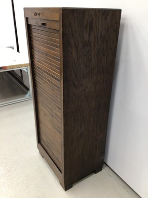 Lot 156 - 1930's oak filing cabinet with pull out sliding trays enclosed by tambour shutter, with lock and key, 47cm wide, 114cm high, 36cm deep