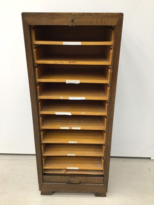 Lot 156 - 1930's oak filing cabinet with pull out sliding trays enclosed by tambour shutter, with lock and key, 47cm wide, 114cm high, 36cm deep