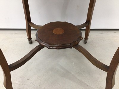 Lot 157 - Edwardian inlaid mahogany and satinwood centre table with shaped top, with chequered stringing and satinwood crossbanding, on four shaped supports and undertier, 78cm diameter