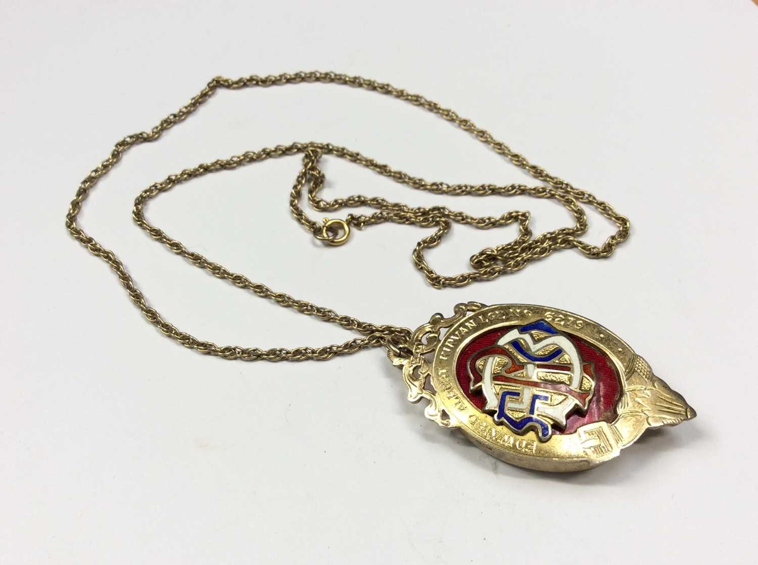 Lot 551 - Silver gilt Masonic enamelled locket pendant