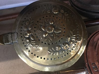 Lot 25 - Group of four antique copper and brass warming pans (4)