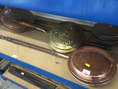 Lot 25 - Group of four antique copper and brass warming pans (4)