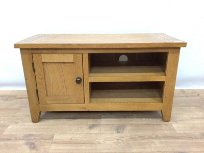 Lot 179 - Contemporary light oak television stand, with open shelves and single panelled door, 91cm wide, 40cm deep, 49.5cm high