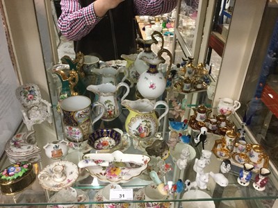 Lot 31 - Collection of decorative porcelain to including miniature cake decorations, miniature tea sets, Wedgwood Ewer, Crested ware and other items (qty)
