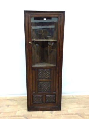 Lot 181 - Old corner cupboard with shelved interior enclosed by glazed and carved panelled door, 65cm wide, 182cm high