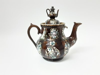 Lot 273 - Victorian Bargeware pottery teapot of large size