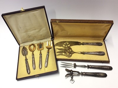 Lot 565 - French silver handled and gilt metal servers and flat ware, together with French silver handled meant fork and holder set