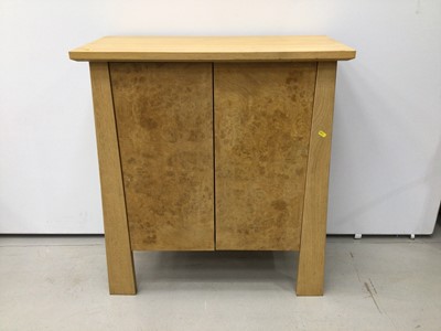 Lot 186 - Light oak cupboard with adjustable shelves enclosed by two doors, 80cm wide, 37cm deep, 90cm high
