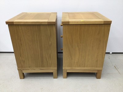 Lot 191 - Contemporary light oak bedroom suite comprising tall narrow chest of five drawers, 48cm wide, 41cm deep, 123cm high, pair of three drawer bedside chests and a double bed, 163cm wide