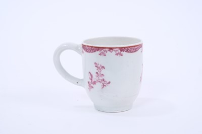 Lot 59 - Rare Lowestoft coffee cup, painted in puce monochrome with flower sprays and sprigs, a red line under the rim and an elaborate puce border below, 6.1cm high