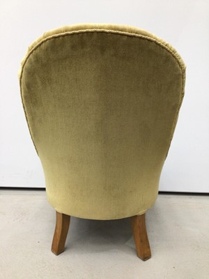 Lot 207 - Victorian nursing chair with buttoned upholstery on cabriole front legs