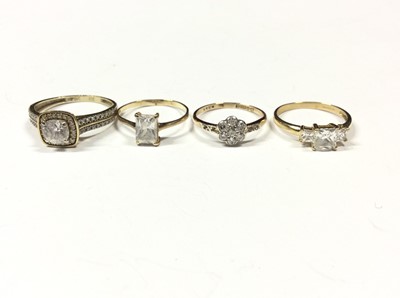 Lot 575 - Four 9ct gold synthetic white stone rings