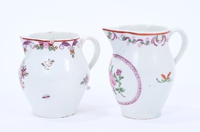 Lot 70 - Two Lowestoft sparrow beak jugs, both painted in the Curtis style with flowers, the first with a puce panel below the spout