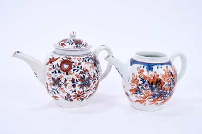 Lot 72 - Large Lowestoft teapot and cover, painted with trailing flowers in underlaze blue, red enamel and gold, 16.5cm high
