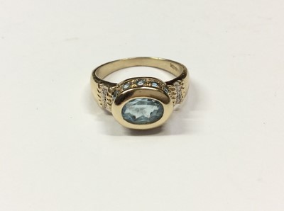Lot 583 - 9ct gold blue stone and diamond ring