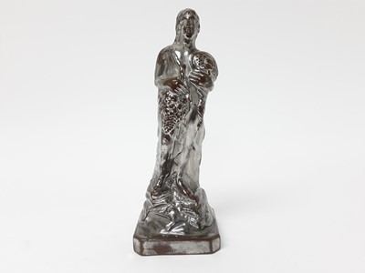 Lot 81 - Unusual Staffordshire silver lustre figure of Plenty, c.1820, shown holding a cornucopia, on a square base with canted corners, 21cm height