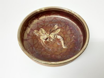 Lot 82 - Pilkington's Royal Lancastrian bowl, the centre decorated with a raised dragonfly, painted with a lustre borders by Gladys Rodgers, impressed mark and monogram to base