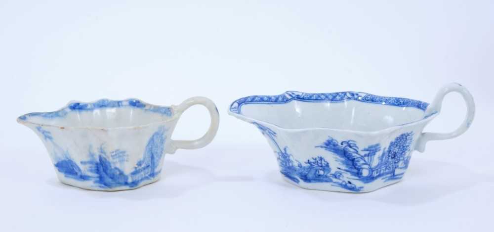 Lot 89 - Two Bow blue and white sauceboats, c.1755, both painted with the Desirable Residence pattern, 14cm and 17cm length