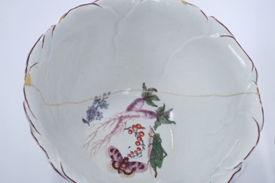 Lot 90 - Chelsea porcelain bowl and dish, c.1750s, the bowl cabbage-leaf moulded, painted around the outside with flowers, fruit and insects, the interior with a grasshopper, butterfly and two purple carrot...