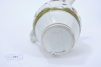 Lot 101 - Prattware pottery jug, c.1800, decorated in relief with a continuous scene representing the nursery rhyme Old Mother Slipper Slopper, 18.5cm high