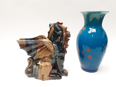 Lot 228 - Unusual Victorian glazed pottery model of a dragon, 27cm high and a blue glazed vase (2)