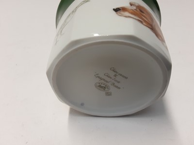 Lot 230 - Two Hermes porcelain cups and saucers depicting dogs - Bassett Hound and Cocker Spaniel, pus a larger cup (5)