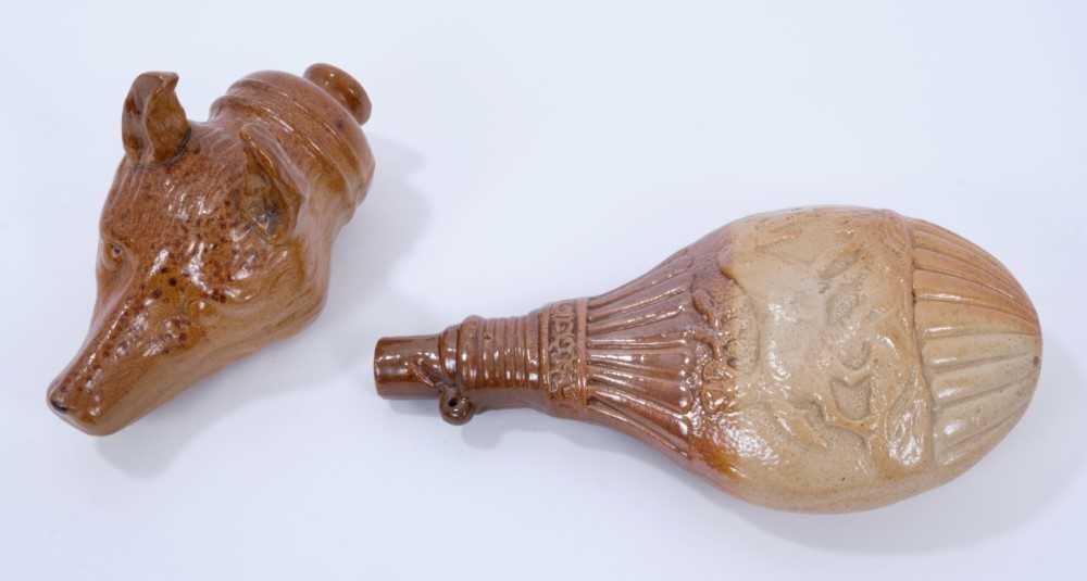 Lot 107 - Salt glazed stirrup flask in the form of a fox's head, c.1850, 14cm long