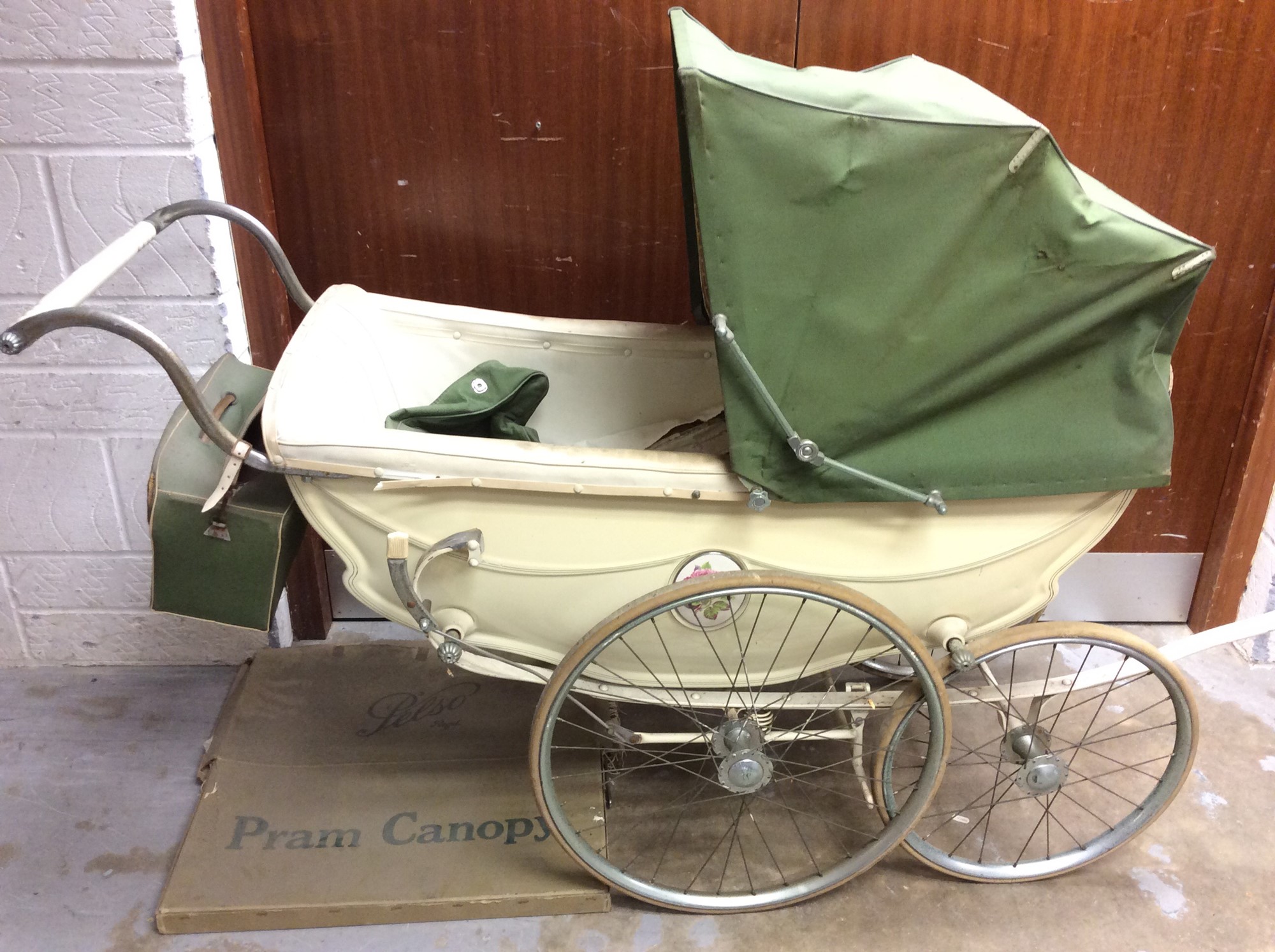 Lot 1123 - Vintage Wilson silver cross type pram in
