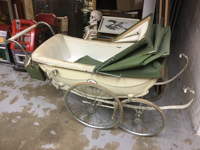 Lot 1123 - Vintage Wilson silver cross type pram in cream with a green hood