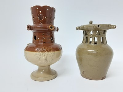 Lot 112 - Two salt glazed stoneware puzzle jugs, one in Doulton style and the other plain, both unmarked, 21.5cm and 18.5cm high