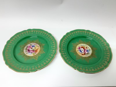 Lot 240 - Set of twelve good quality Royal Worcester plates with handpainted floral decoration on green and gilt ground, all signed Stanley, 23cm diameter