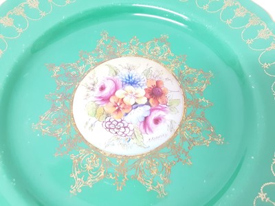 Lot 240 - Set of twelve good quality Royal Worcester plates with handpainted floral decoration on green and gilt ground, all signed Stanley, 23cm diameter