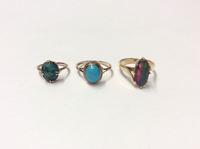 Lot 619 - 9ct gold turquoise stone ring in four claw setting, 9ct gold oval turquoise cabochon ring and yellow metal opal doublet ring