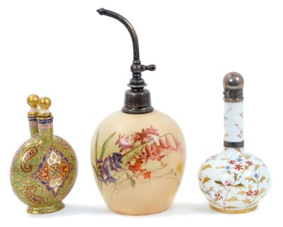 Lot 712 - Highly unusual Coalport porcelain Islamic style scent bottle, together with a Royal Worcester atomiser and silver mounted Wedgwood sent bottle. (3)