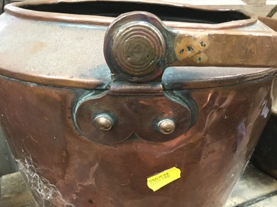 Lot 87 - Two large antique copper preserve pans together with a copper coal bucket (3)