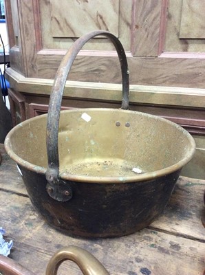Lot 88 - Antique copper preserve pan, antique brass preserve pan and a brass cauldron (3)