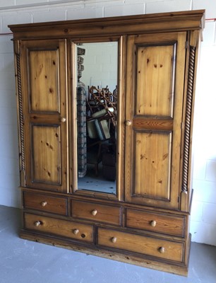 Lot 3 - Pine bedroom suite - comprising king size bed, two bedside cabinets and wardrobe