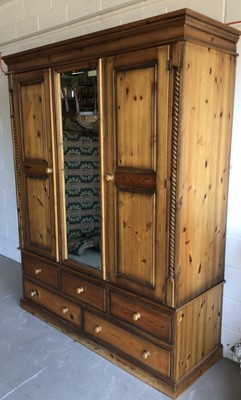 Lot 3 - Pine bedroom suite - comprising king size bed, two bedside cabinets and wardrobe