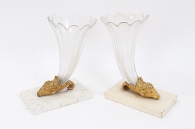 Lot 765 - Near pair of 19th century ormolu and clear glass epergnes