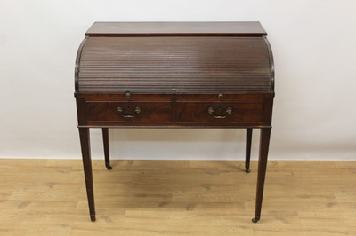 Lot 1420 - Late 19th century mahogany writing table with tambour barrel top and fitted interior