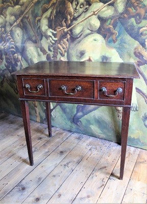 Lot 1505 - 18th century oak lowboy, with three short drawers, each with original brass drop handles on square tapered legs, 81cm wide x 50c, deep x 76cm high