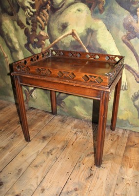 Lot 1506 - Fruitwood tray on stand, with pierced fret carved gallery on stand with square internally chamfered legs, 64cm wide x 47cm deep x 62cm high