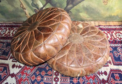 Lot 1518 - Pair of vintage brown leather circular pouffes, diameter approximately 67cm