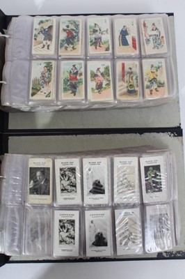 Lot 136 - Cigarette cards - Two blue binders (Nos 1/2) containing a large selection of miscellaneous cards.