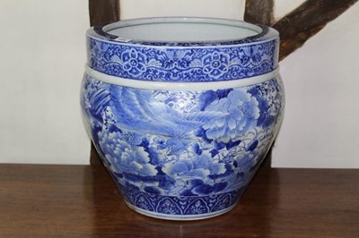 Lot 1528 - Large Japanese Meiji period blue and white jardinière, decorated with foliate ornament, 41cm high x 48cm diameter